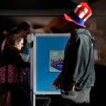 Voters cast their ballots at Allegiant Stadium on Tuesday, Nov. 5, 2024, in Las Vegas.