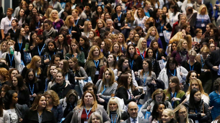 Women file out of a luncheon at the Massachusetts Conference for Women.