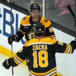 Boston Bruins Tyler Johnson, (90), and Boston Bruins center Pavel Zacha (18) celebrate after Jonson scored what turned out to be the game winner during the third period. The Boston Bruins host the Philadelphia Flyers October 1, 2024 in a pre-season game at TD Garden in Boston, MA.