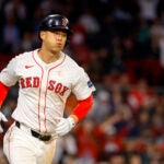 Rob Refsnyder runs down the first baseline after hitting a solo home run against the Orioles.