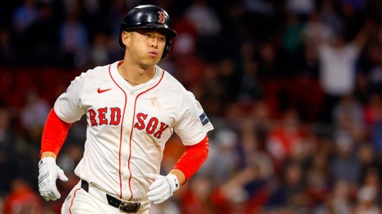 Rob Refsnyder runs down the first baseline after hitting a solo home run against the Orioles.