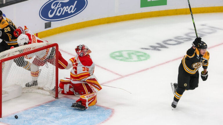 Marchand OT goal leads Bruins to 4-3 victory over Flames