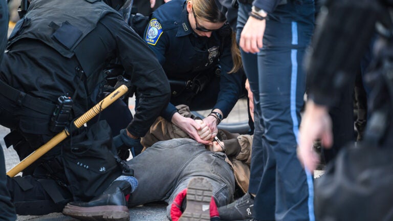 Police arrest a person in Kenmore Square at the Men’s March to Abolish Abortion and Rally for Personhood starting at Planned Parenthood on Commonwealth Avenue on Saturday.