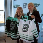 The PWHL Boston team, the Fleet hosted an event at at the View (the old top of the Pru Boston ) introducing their new jerseys. L-R General Manager Danielle Marmer and Head Coach Courtney Kessel hold the jerseys.