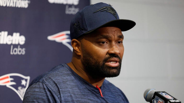 New England Patriots head coach Jerod Mayo talks during a press conference after the 30-17 loss to the Arizona Cardinals at State Farm Stadium.