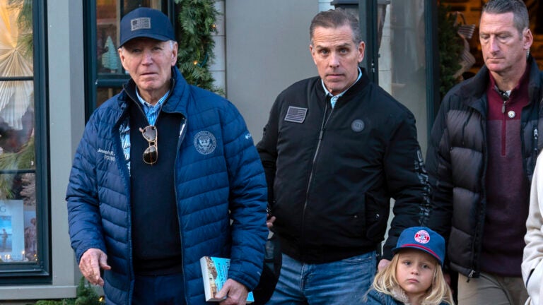 President Joe Biden is accompanied by his son Hunter Biden and his grandson Beau.