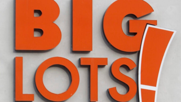 A shopper leaves the Big Lots store.