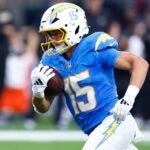 INGLEWOOD, CALIFORNIA - OCTOBER 27: Ladd McConkey #15 of the Los Angeles Chargers runs for a touchdown at SoFi Stadium on October 27, 2024 in Inglewood, California.
