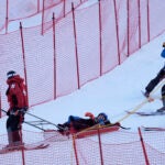 Mikaela Shiffrin is taken down the mountain on a sled by ski patrol after crashing during the second run of a women's World Cup giant slalom skiing race, Saturday, Nov. 30, 2024, in Killington, Vt.
