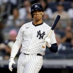 New York Yankees' Juan Soto reacts during the first inning of a baseball game against the St. Louis Cardinals Friday, Aug. 30, 2024, in New York.