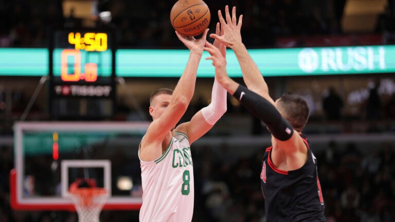 Kristaps Porzingis shoots a 3-pointer during a game against the Bulls.