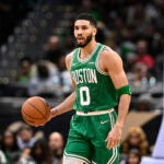Boston Celtics forward Jayson Tatum (0) in action during the second half of an NBA basketball game against the Washington Wizards, Sunday, Dec. 15, 2024, in Washington. The Celtics won 112-98.