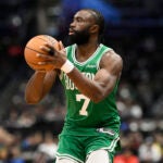Boston Celtics guard Jaylen Brown (7) in action during the second half of an NBA basketball game against the Washington Wizards, Sunday, Dec. 15, 2024, in Washington. The Celtics won 112-98.