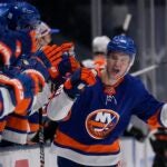 New York Islanders' Oliver Wahlstrom (26) celebrates with teammates after scoring a goal during the third period of an NHL hockey game against the Philadelphia Flyers Thursday, March 18, 2021, in Uniondale, N.Y.