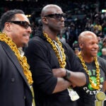 Boston Celtics greats Paul Pierce, Kevin Garnett and Ray Allen (from left) following a banner raising ceremony prior to an NBA basketball game, Tuesday, Oct. 22, 2024, in Boston.