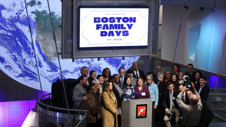 Mayor Michelle Wu joined school leaders and representatives from Boston's cultural institutions for a group photo after announcing Boston Family Days, an expansion of the BPS Sundays pilot program.