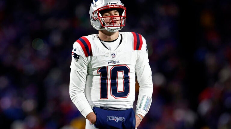 New England Patriots quarterback Drake Maye (10) reacts after throwing an interception in the end zone during the third quarter at Highmark Stadium.