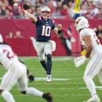 New England Patriots quarterback Drake Maye (10) throws against the Arizona Cardinals during the second half of an NFL football game, Sunday, Dec. 15, 2024, in Glendale, Ariz. (