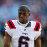 New England Patriots wide receiver Javon Baker (6) walks off the field following an NFL football game against the Tennessee Titans, Sunday, Nov. 3, 2024, in Nashville, Tenn.