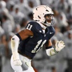 Penn State defensive end Abdul Carter (11) pass rushes during the third quarter of an NCAA college football game against Washington, Saturday, Nov. 9, 2024, in State College, Pa.