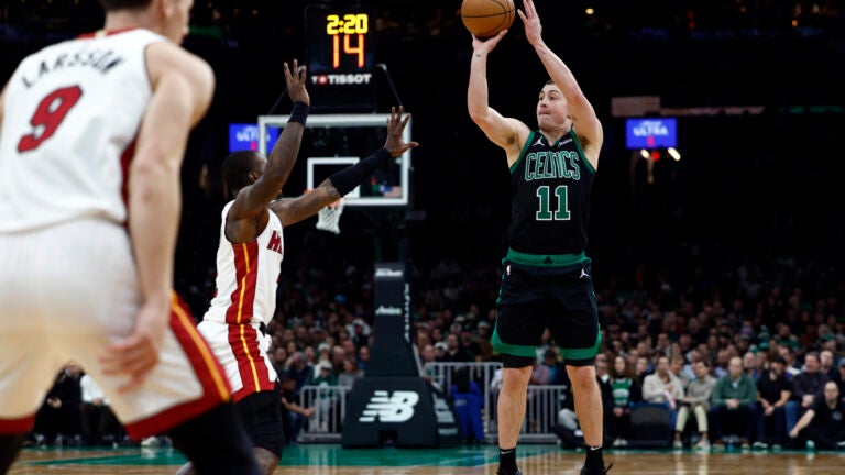 Celtics guard Payton Pritchard makes a 3-point basket during the first quarter.