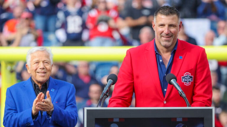 Former New England Patriots Mike VrabelÕs speaking at his New England Patriots Hall of Fame induction ceremony with owner Robert Kraft (background) during halftime against the Buffalo Bills during NFL action at Gillette Stadium.