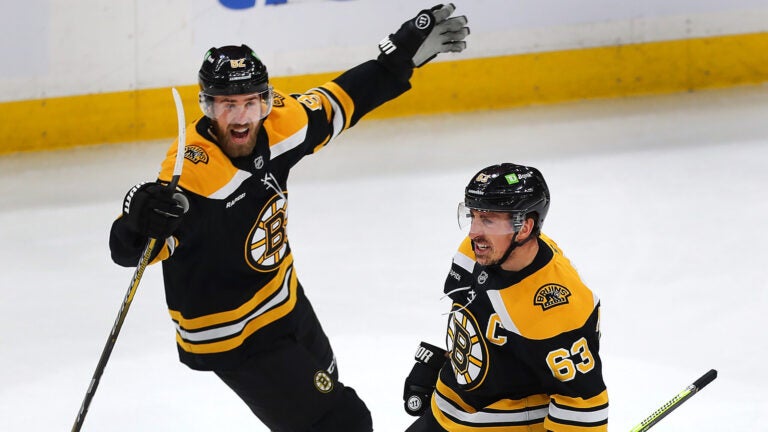 Boston-12/7/2024 Bruins vs Flyers—Boston Bruins left wing Brad Marchand (63) celebrates his 3rd period goal to tie. the game, 3-3 with Jordan Oesterie.