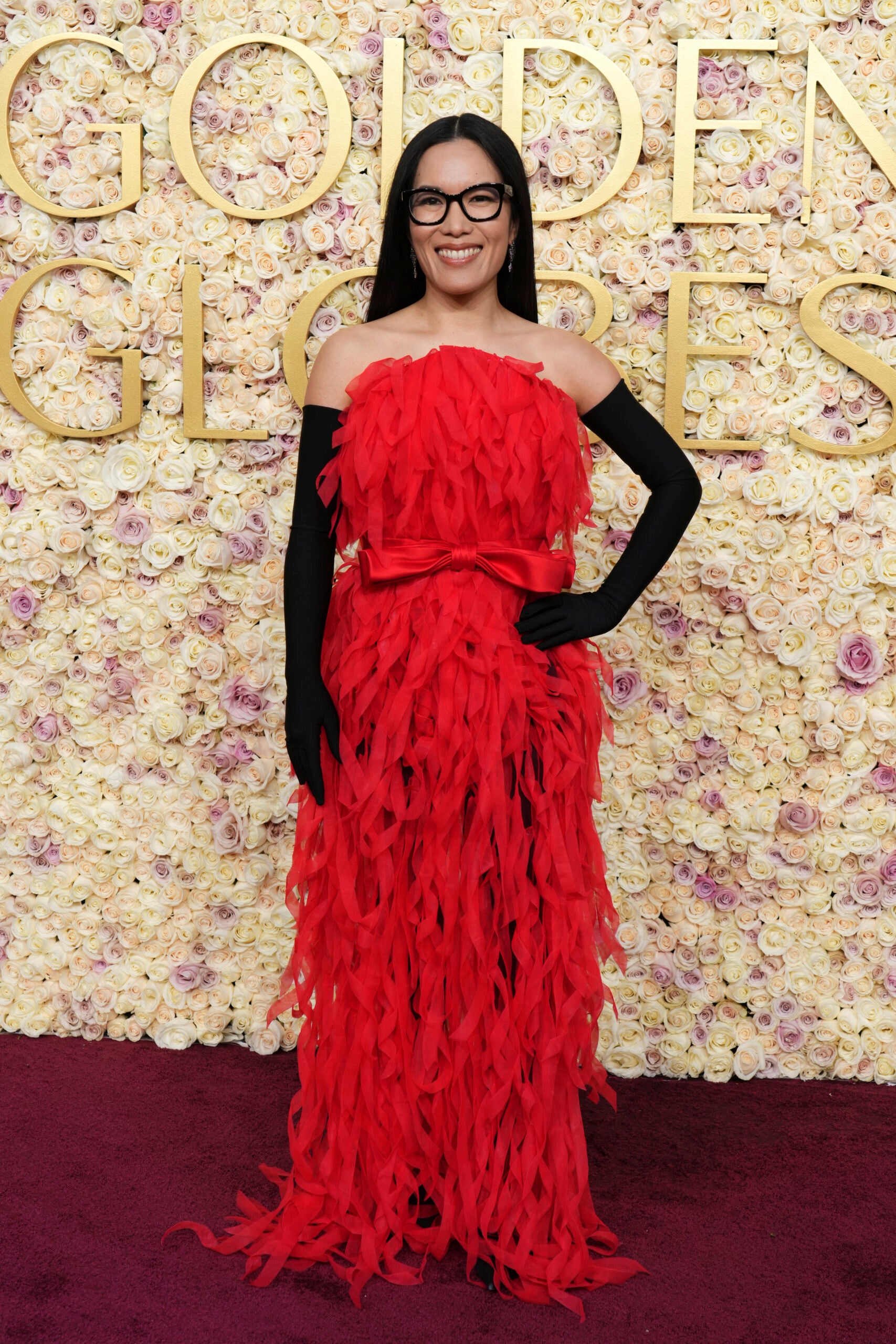 Ali Wong arrives at the 82nd Golden Globes. 