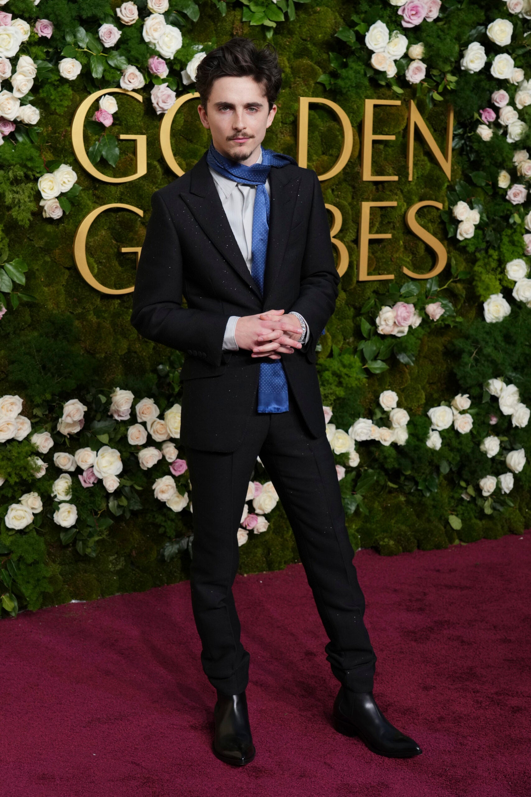 Timothee Chalamet arrives at the 82nd Golden Globes.