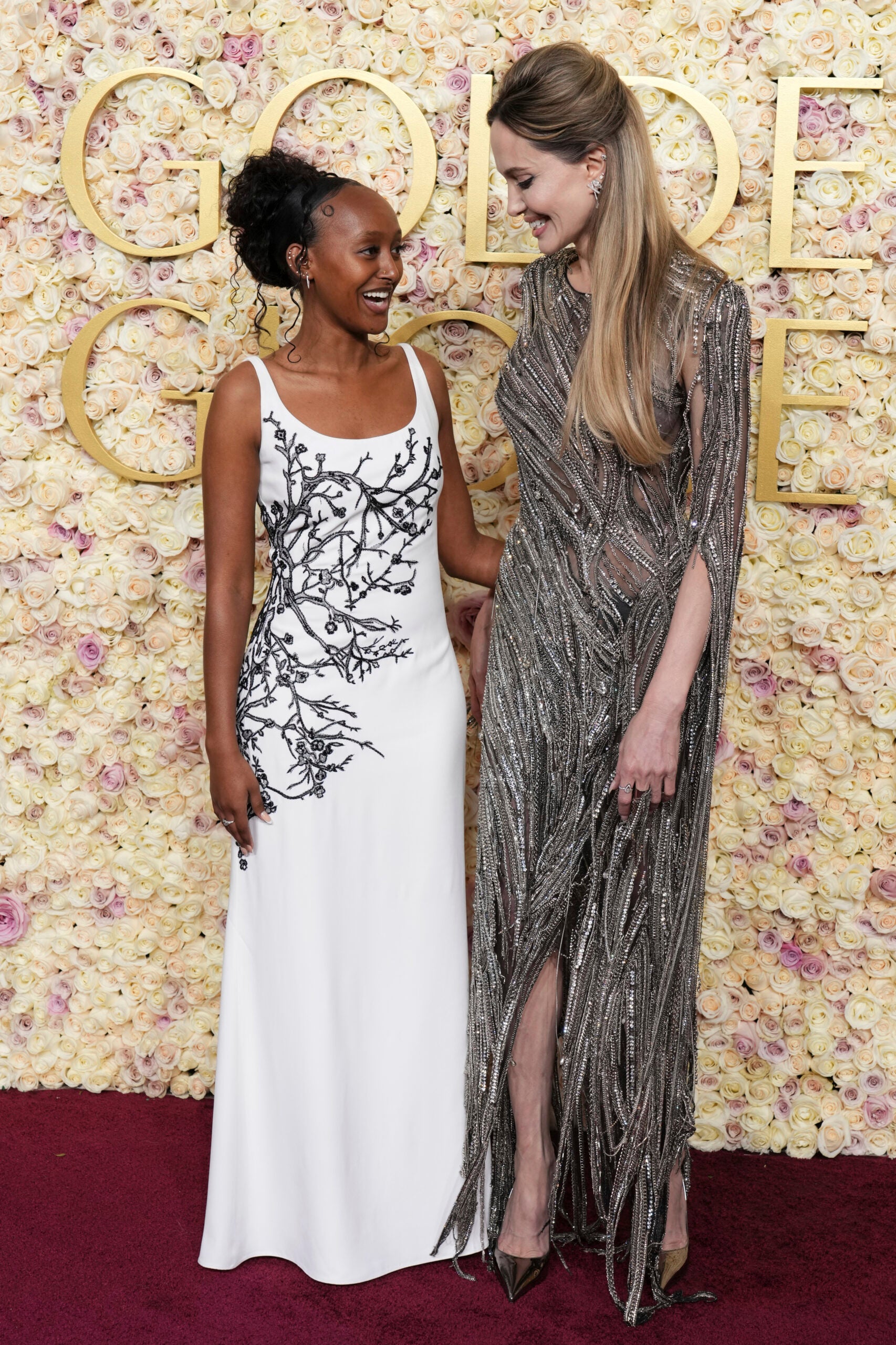 Zahara Jolie and Angelina Jolie arrive at the 82nd Golden Globes.