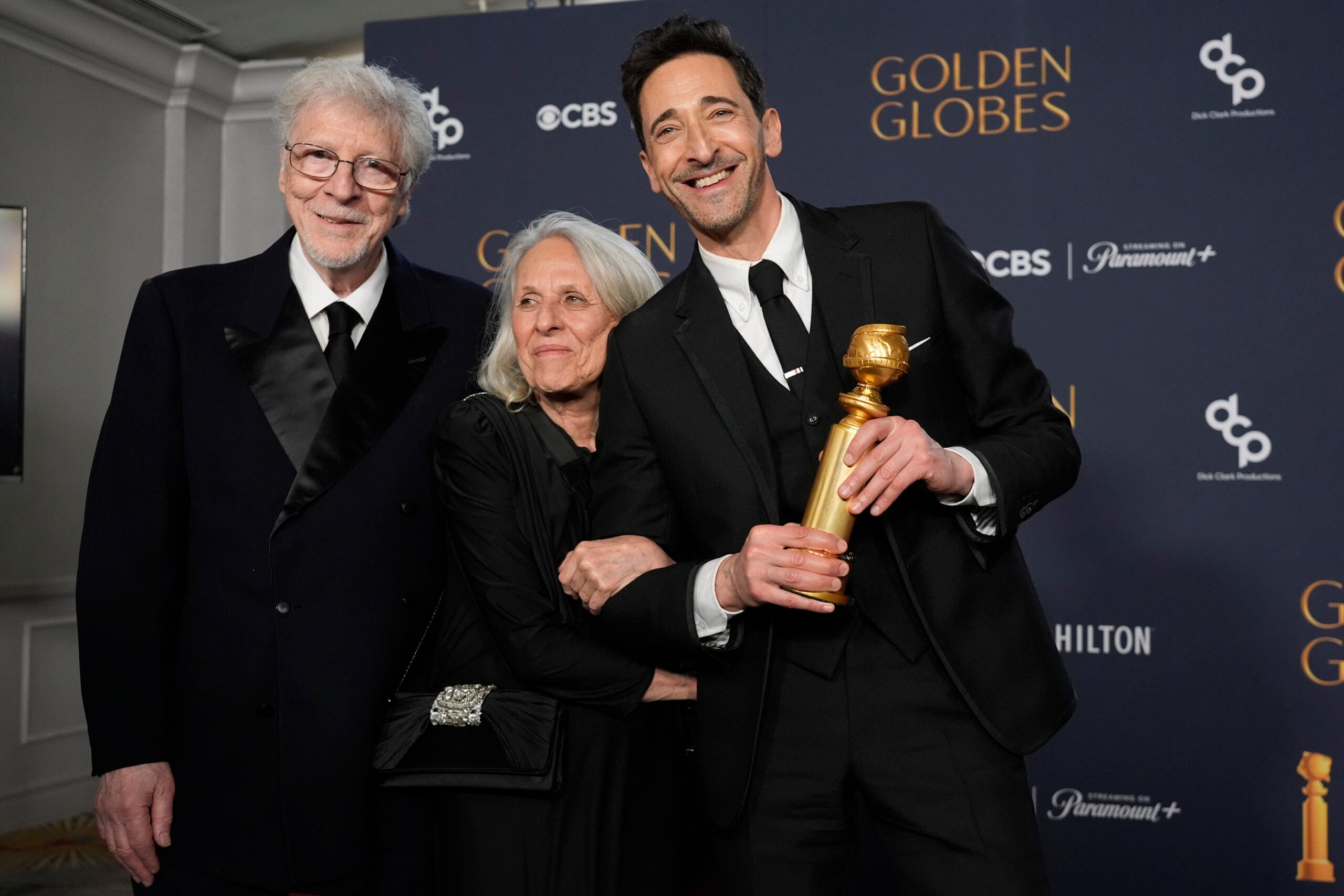 Elliot Brody, Sylvia Plachy e Adrien Brody.