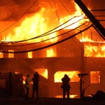 Beach front homes are destroyed by the Palisades Fire Wednesday, Jan. 8.