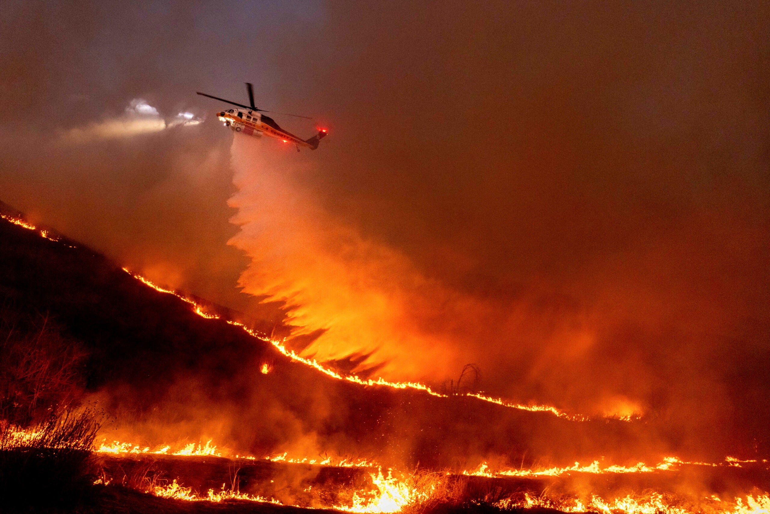 Firefighters hope for a break from fierce winds fueling