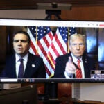 U.S. President-elect Donald Trump appears remotely.