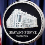 The logo for the Justice Department.