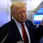 President Donald Trump speaks to reporters.