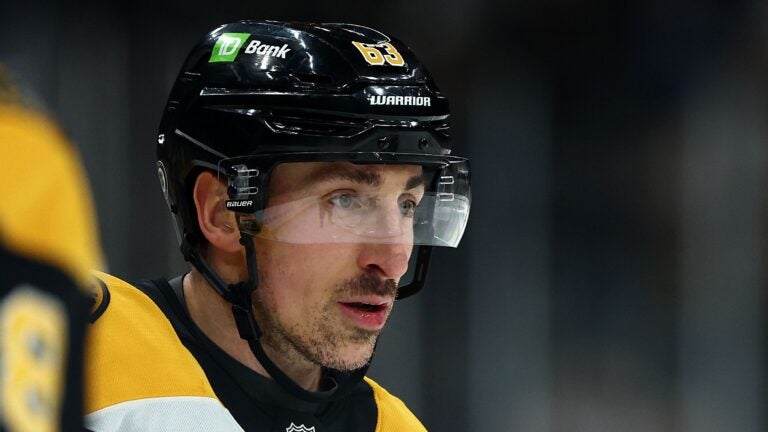 BOSTON, MASSACHUSETTS - JANUARY 23: Brad Marchand #63 of the Boston Bruins looks on during the third period against the Ottawa Senators at TD Garden on January 23, 2025 in Boston, Massachusetts. The Bruins defeat the Senators 2-0.
