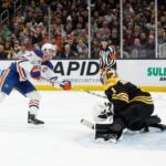 Connor McDavid of the Edmonton Oilers scores against Jeremy Swayman of the Bruins during the second period.