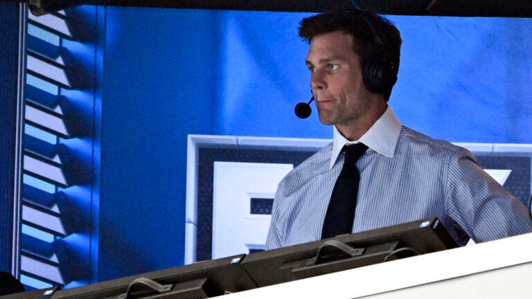 Former NFL quarterback Tom Brady looks on from the broadcast booth during the second half of an NFL football game between the Dallas Cowboys and the New Orleans Saints, Sunday, Sept. 15, 2024, in Arlington, Texas.