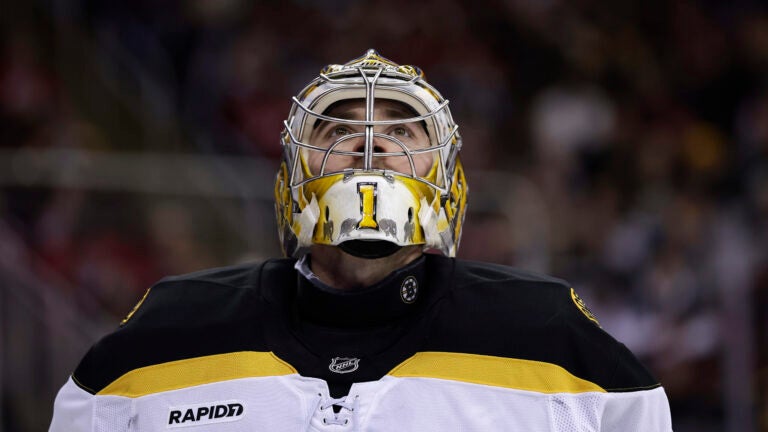 Boston Bruins goaltender Jeremy Swayman (1) reacts during the second period of an NHL hockey game against the New Jersey Devils Wednesday, Jan. 22, 2025, in Newark, N.J. The Devils won 5-1.