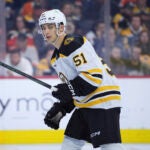 Boston Bruins' Matthew Poitras plays during an NHL hockey game, Saturday, Nov. 2, 2024, in Philadelphia.