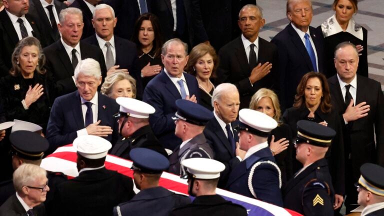 U.S. Military Body Bearers carry the flag-draped casket bearing the remains of former U.S. President Jimmy Carter from the Washington National Cathedral following his state funeral as (L-R) Former U.S. Vice Presidents Al Gore and Mike Pence, Karen Pence, former U.S. President Bill Clinton, former Secretary of State Hillary Clinton, former U.S. President George W. Bush, Laura Bush, former U.S. President Barack Obama, U.S. President-elect Donald Trump, Melania Trump, U.S. President Joe Biden, first lady Jill Biden U.S. Vice President Kamala Harris and second gentleman Doug Emhoff look on on January 09, 2025 in Washington, DC.