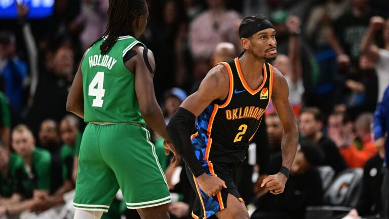 Shai Gilgeous-Alexander #2 of the Oklahoma City Thunder flexes after a big play during the second half against the Boston Celtics at Paycom Center on January 5, 2025 in Oklahoma City, Oklahoma.