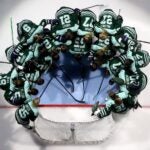 SEATTLE, WASHINGTON - JANUARY 05: The Boston Fleet gather before a PWHL Takeover Tour game against Montreal Victoire at Climate Pledge Arena on January 05, 2025 in Seattle, Washington.