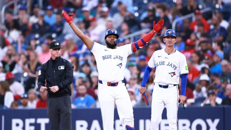 TORONTO, ON - SEPTEMBER 03: Vladimir Guerrero Jr. #27 of the Toronto Blue Jays celebrates after hitting a single in the first inning during a game against the Philadelphia Phillies at Rogers Centre on September 03, 2024 in Toronto, Ontario, Canada.