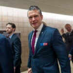 Pete Hegseth, President-elect Donald Trump's nominee to be Defense Secretary, walks to meet with senators, at the Capitol in Washington, Tuesday, Dec. 17, 2024.