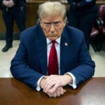 FILE - Former President Donald Trump waits for the start of proceedings in Manhattan criminal court, April 23, 2024, in New York.