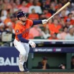 HOUSTON, TEXAS - OCTOBER 02: Alex Bregman #2 of the Houston Astros flies out against the Detroit Tigers in the fourth inning during Game Two of the Wild Card Series at Minute Maid Park on October 02, 2024 in Houston, Texas.