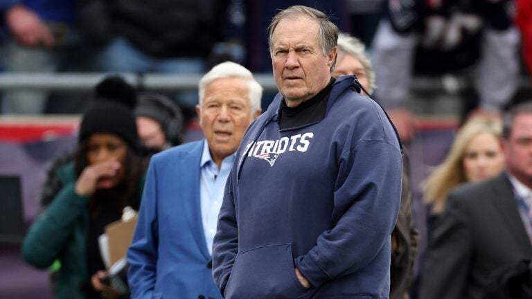 FOXBOROUGH, MASSACHUSETTS - DECEMBER 17: New England Patriots owner Robert Kraft and Head Coach Bill Belichick look on from the sideline before the game against the Kansas City Chiefs at Gillette Stadium on December 17, 2023 in Foxborough, Massachusetts.