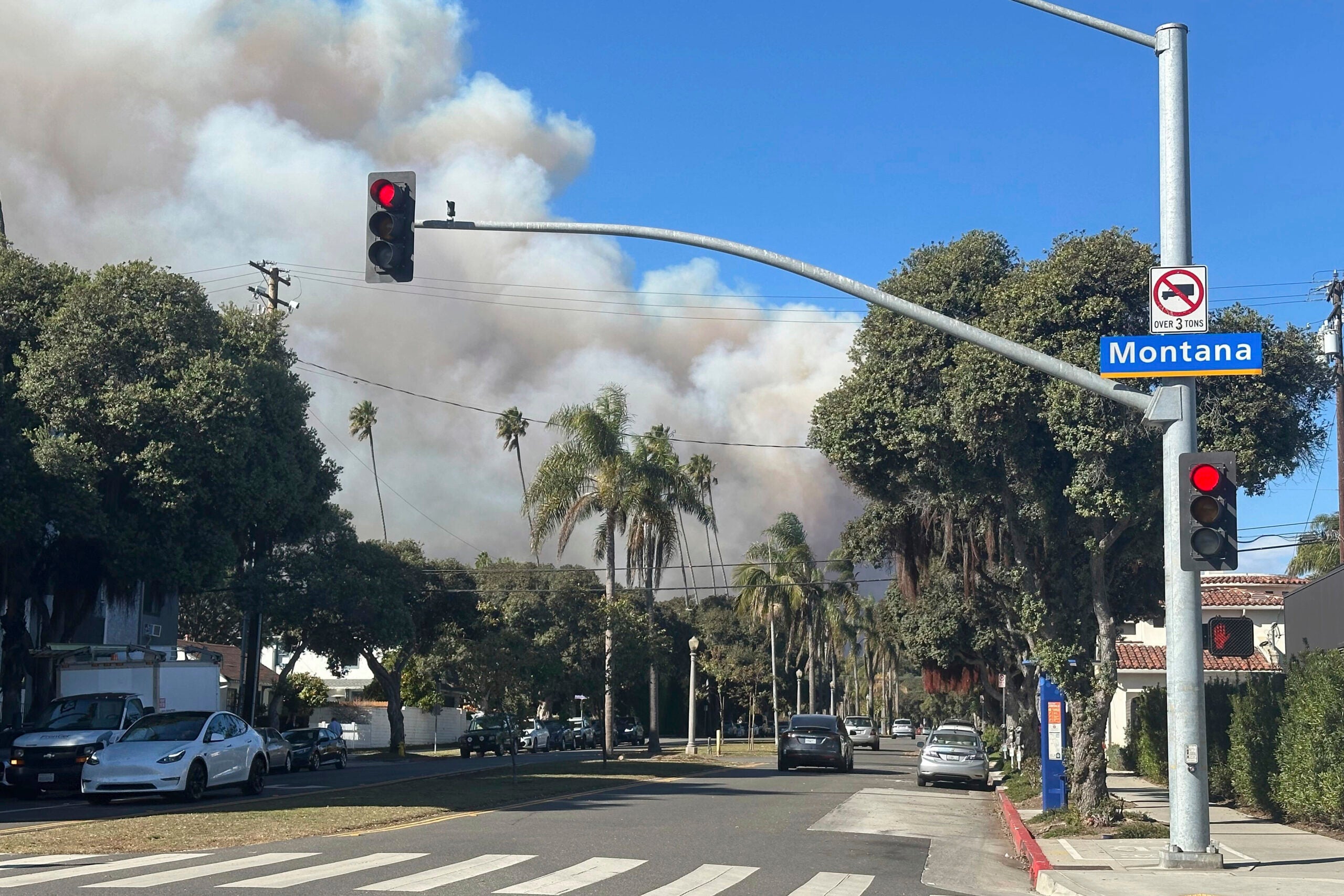 Los Angeles residents flee fire as winds gain strength